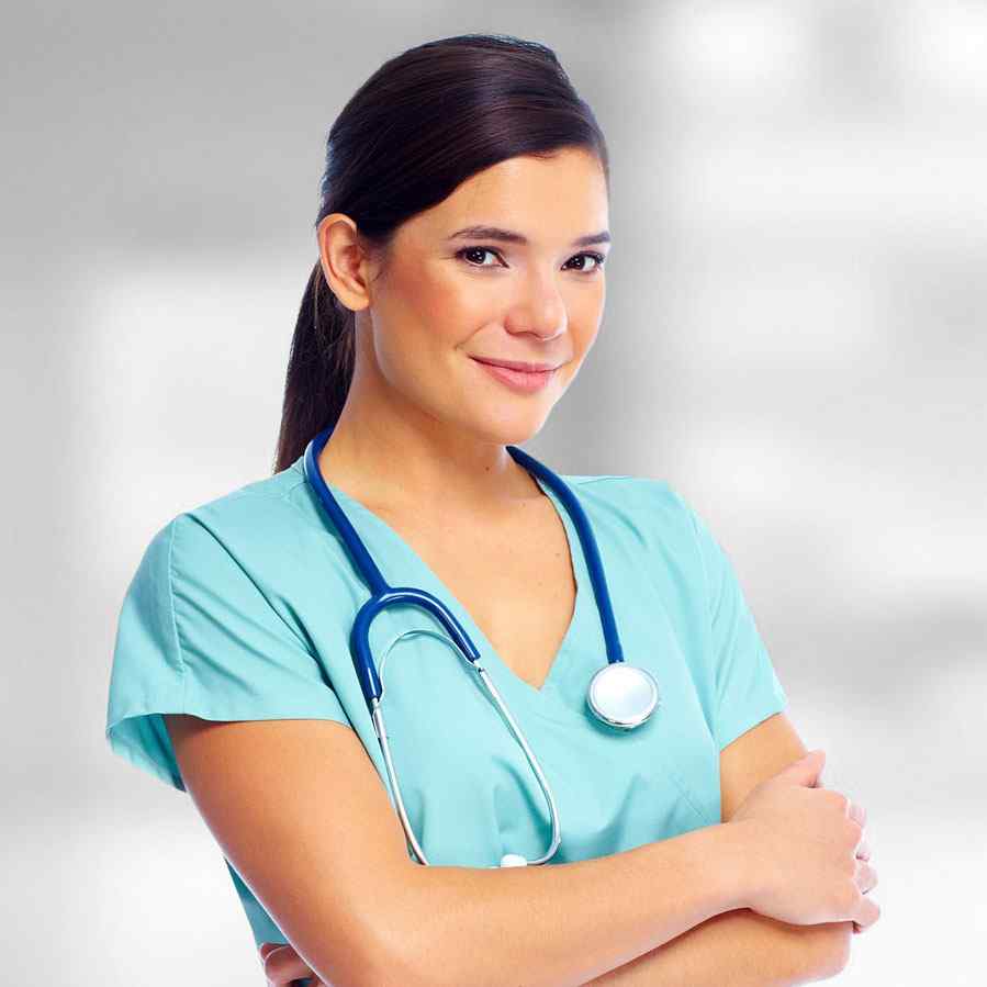 Confident female nurse in scrubs with a stethoscope.